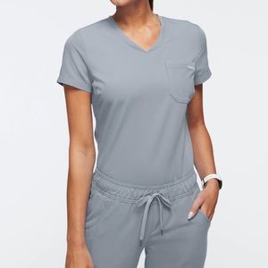 Jaanuu classic front chest pocket v neck scrub top light grey small